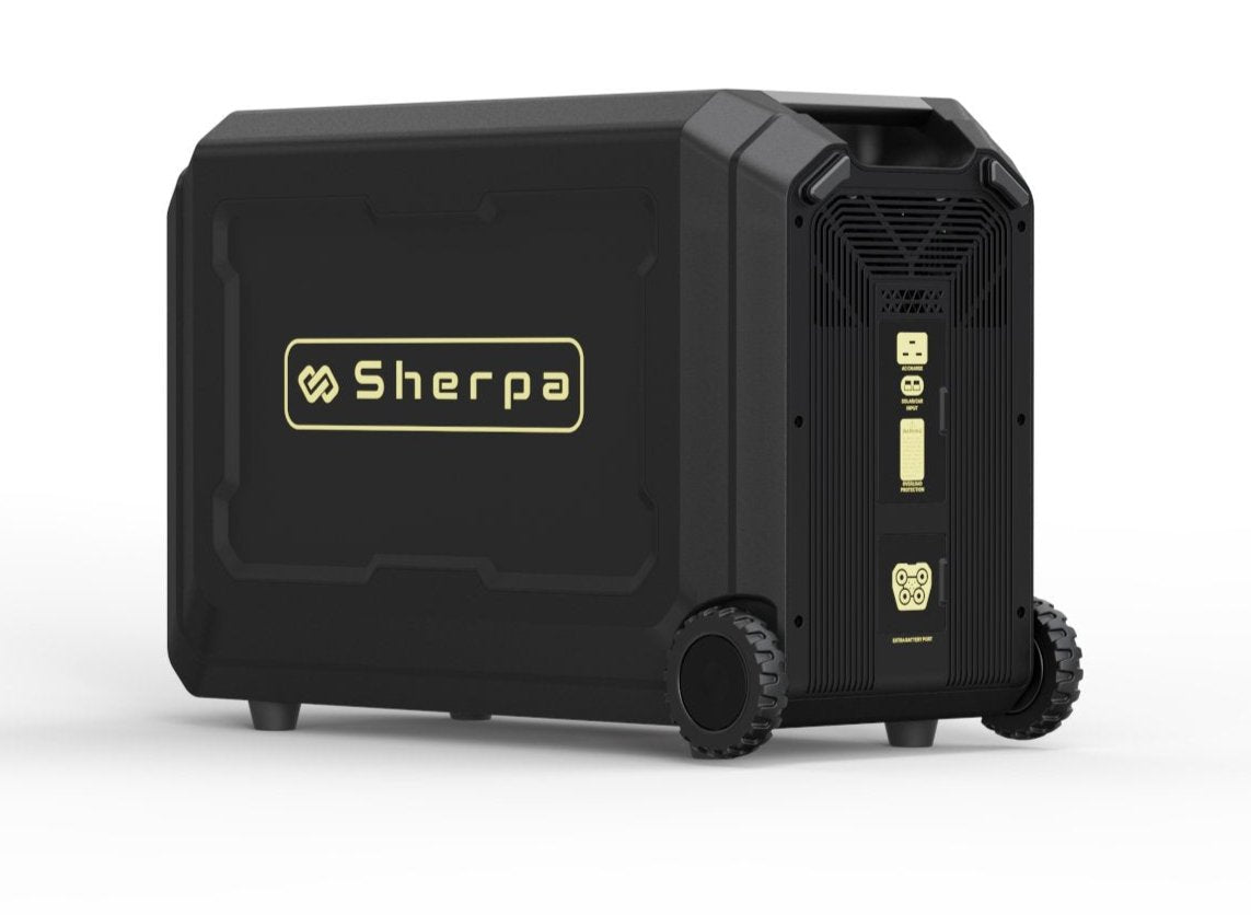 Right rear angle of mobile power unit, featuring mobility wheels, expansion port, AC and solar DC inputs