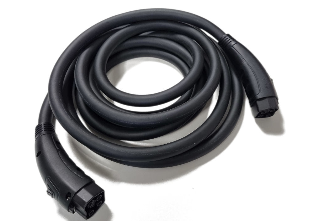 A thick black coiled cable with large connectors 